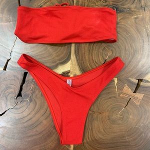 Red two piece bathing suit.